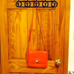Used Kate spade square shaped, leather crossbody